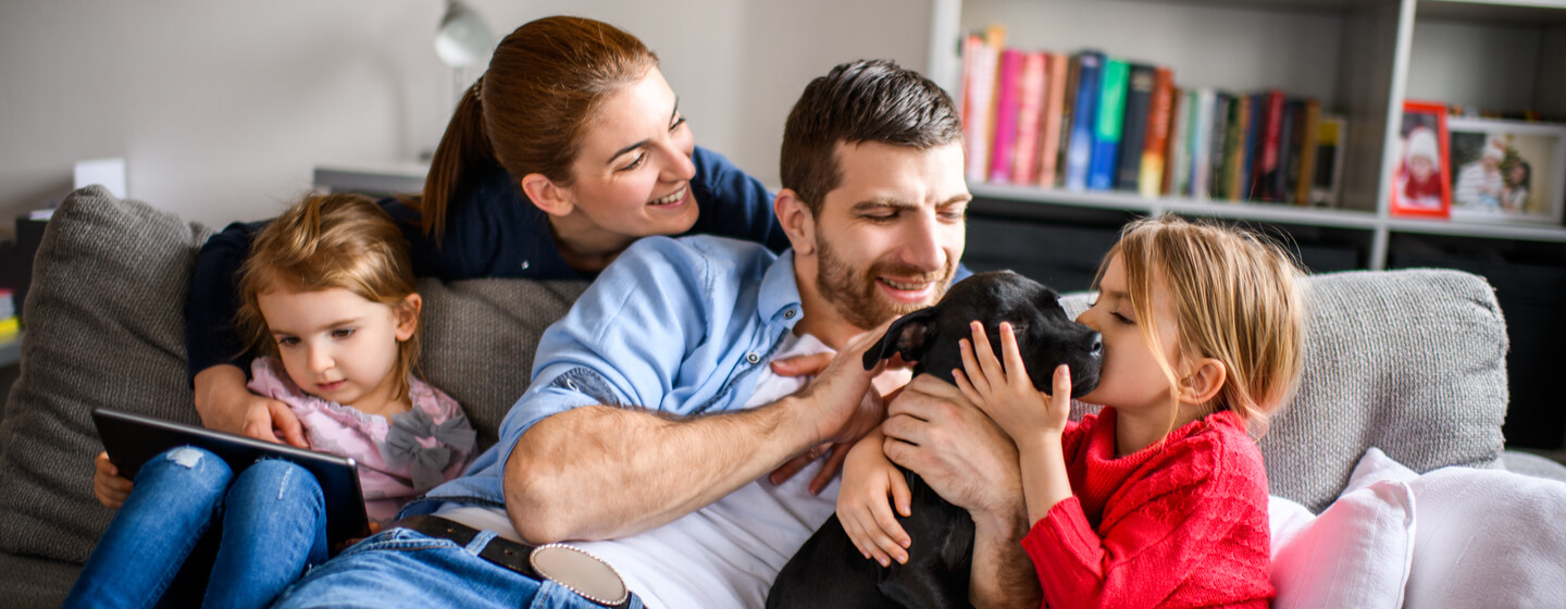 Family with a store dog